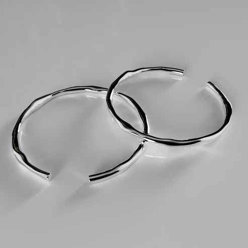 Silver bracelet, adjustable and irregular in shape