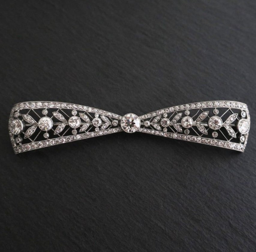 Milgrain Round Cut White Sapphire Bow Brooch