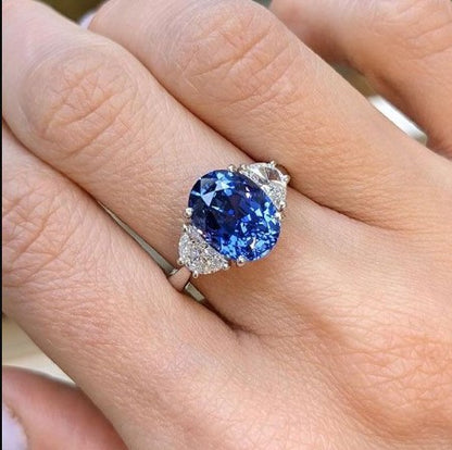 Three-Stone Oval Cut Blue Sapphire Engagement Ring
